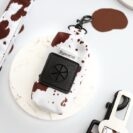 etui na woreczki dla psa Puppy Cow – brązowo-biały print